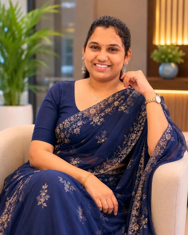 Maj. Reshma Jayaraj, BeeRN founder and mentor, seated in a navy blue saree
