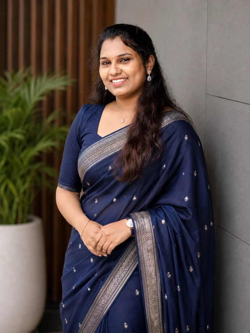 Maj. Reshma Jayaraj in a navy blue saree